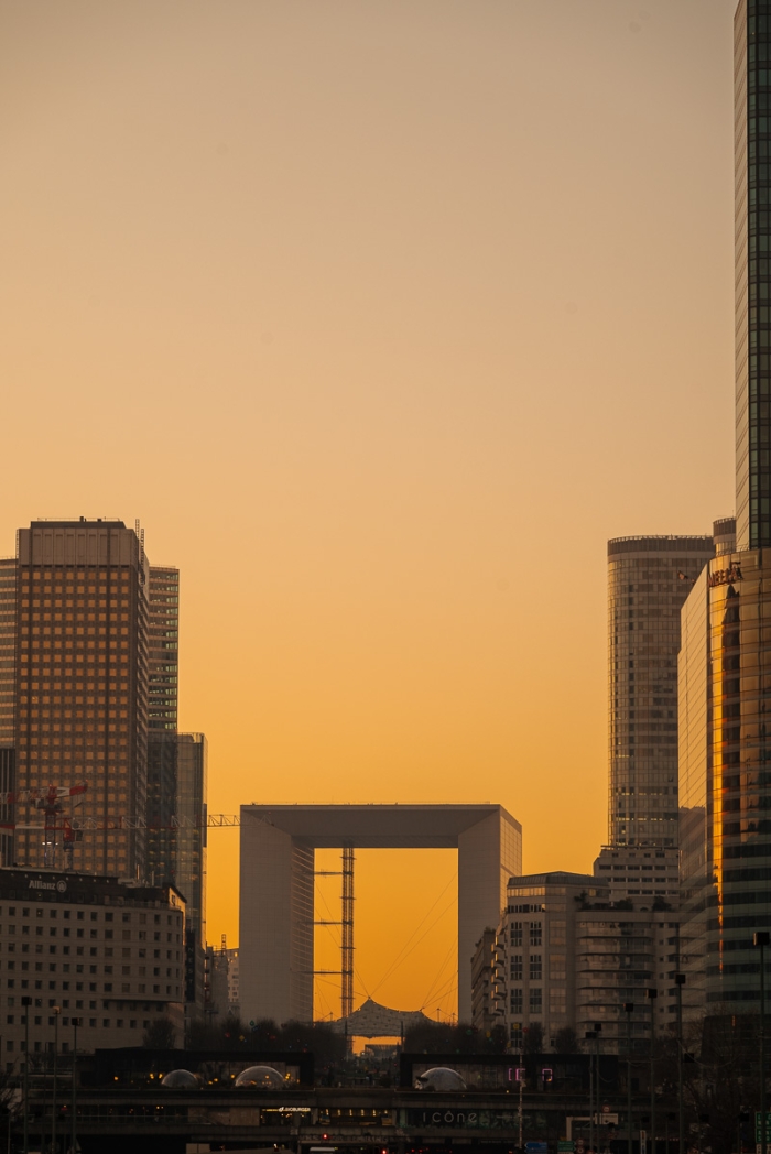 Perspective de La Défense depuis le Pont de Neuilly en fin de journée - Photo : © Sebastien Desnoulez photographe d'ambiances et d'architecture